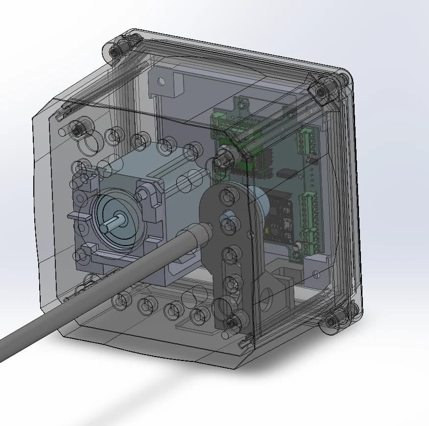 Transparent enclosure CAD revealing the motor, drive shaft, bearings, control hardware, and mounting fasteners