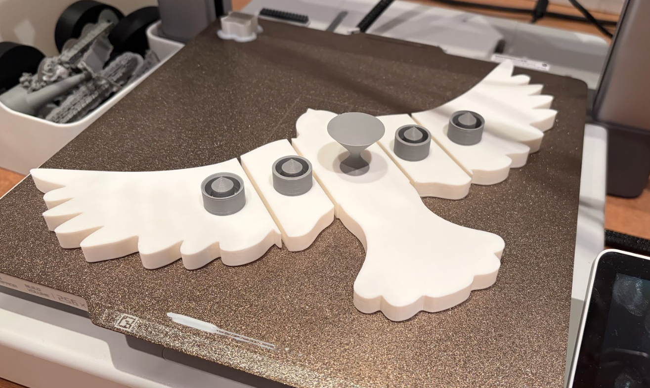 bird in the process of being 3d printed